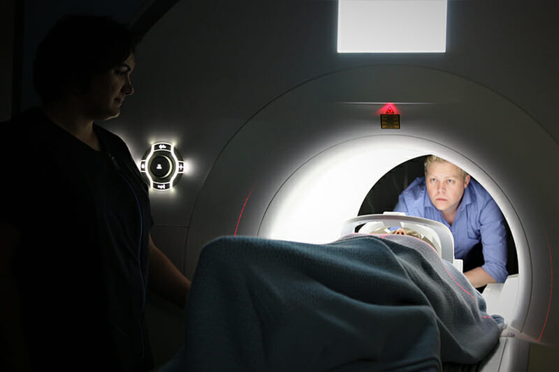doctor watching patient in MRI